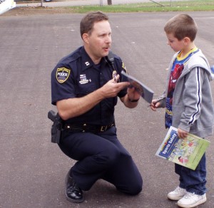 cop talking to kid